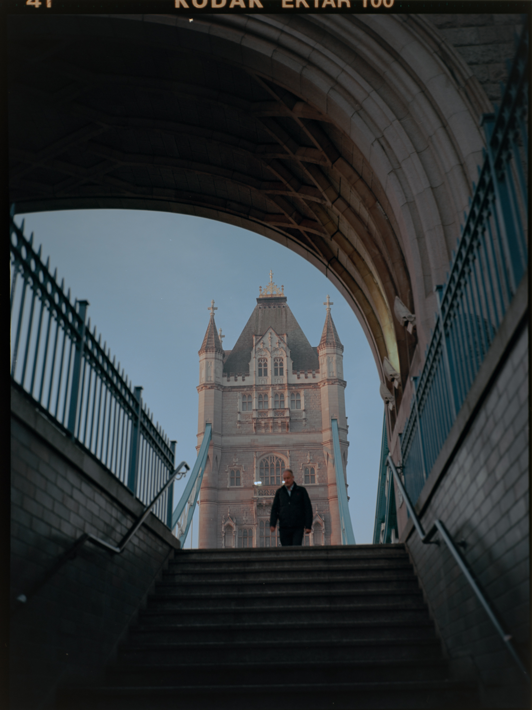 Tower Bridge from the riverside with Thames speedboat — film photography London