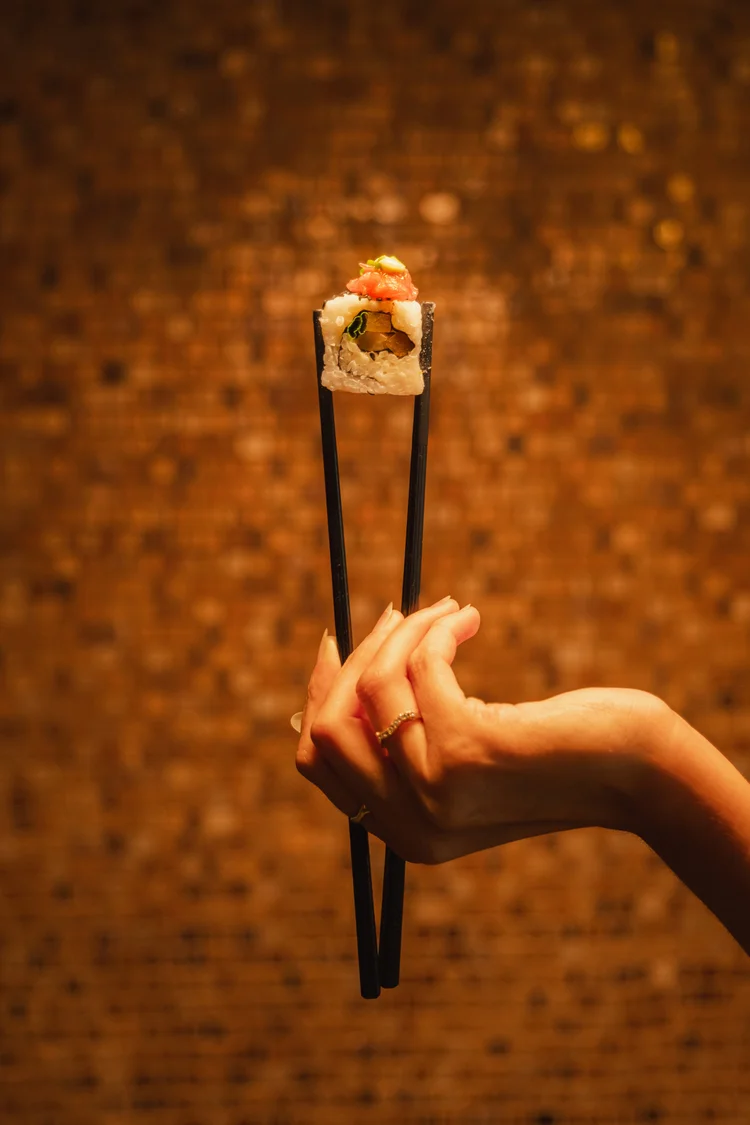 Chopsticks sushi roll gold mosaic wall hotel