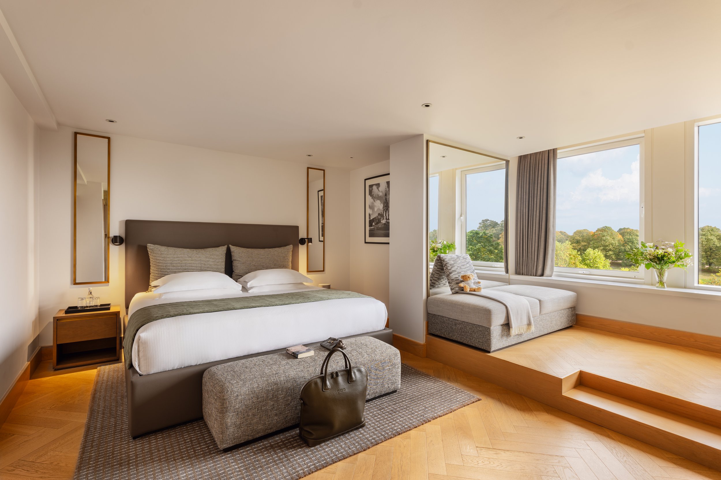 Luxury park suite king bedroom herringbone oak floor garden view