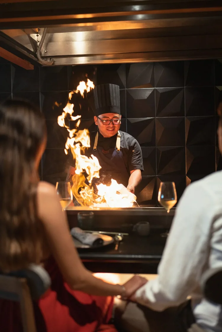 Restaurant chef flambe open kitchen Hyatt Zilara