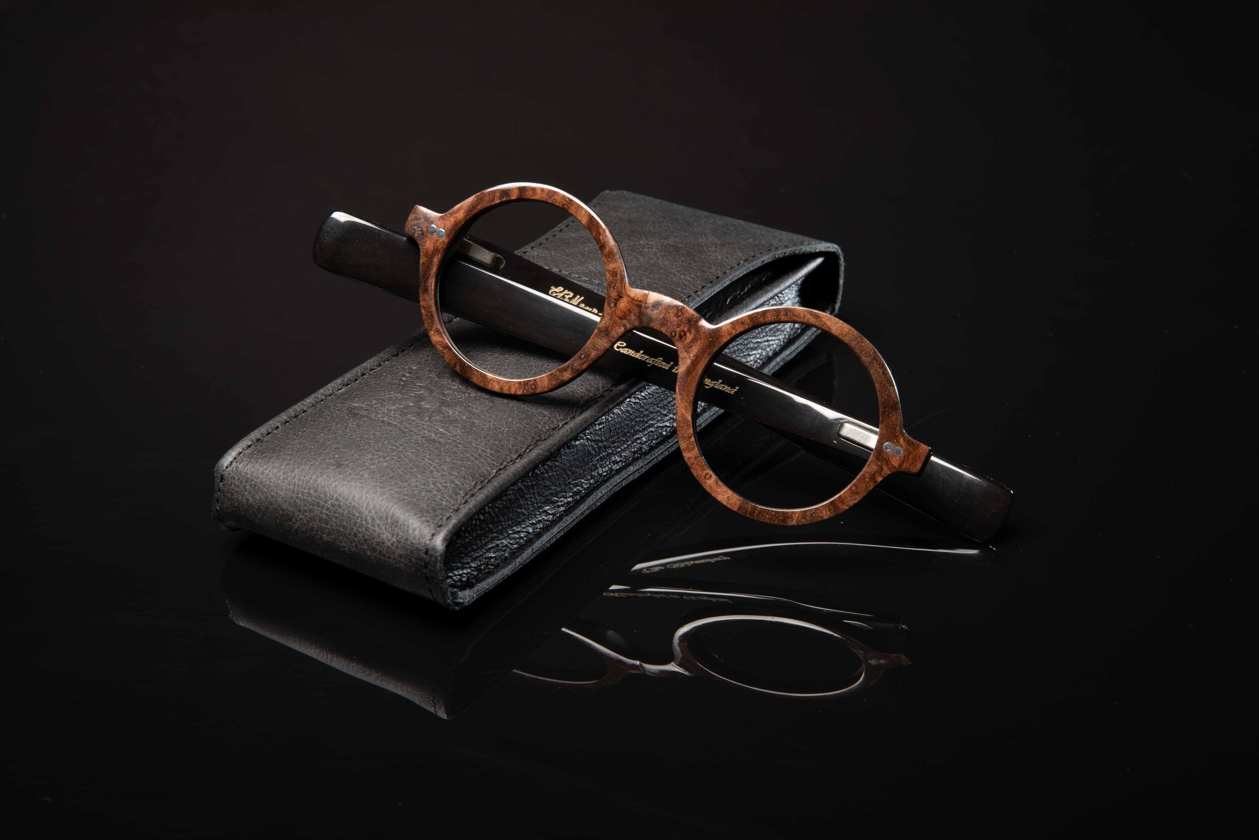 EB Meyrowitz glasses on dark background, product photography London