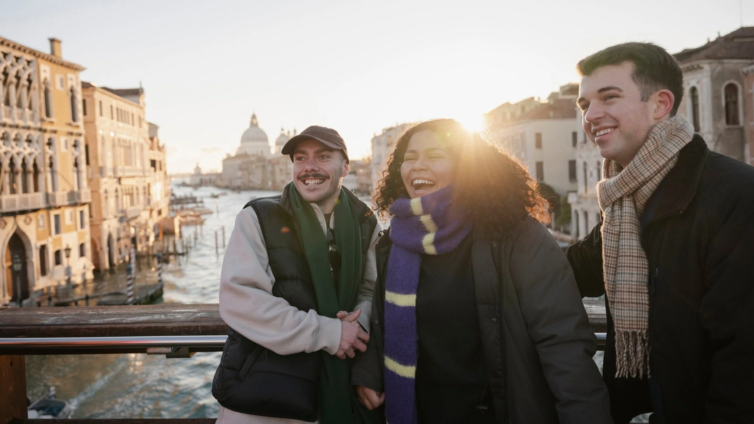 Contiki travel group campaign friends Venice canal bridge
