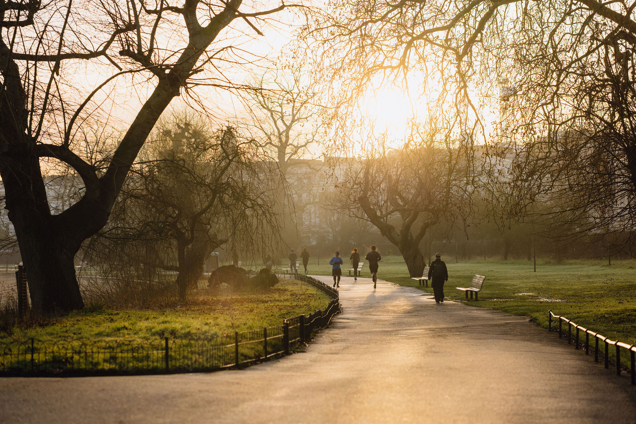 Couple walking through Regents Park London, lifestyle photography