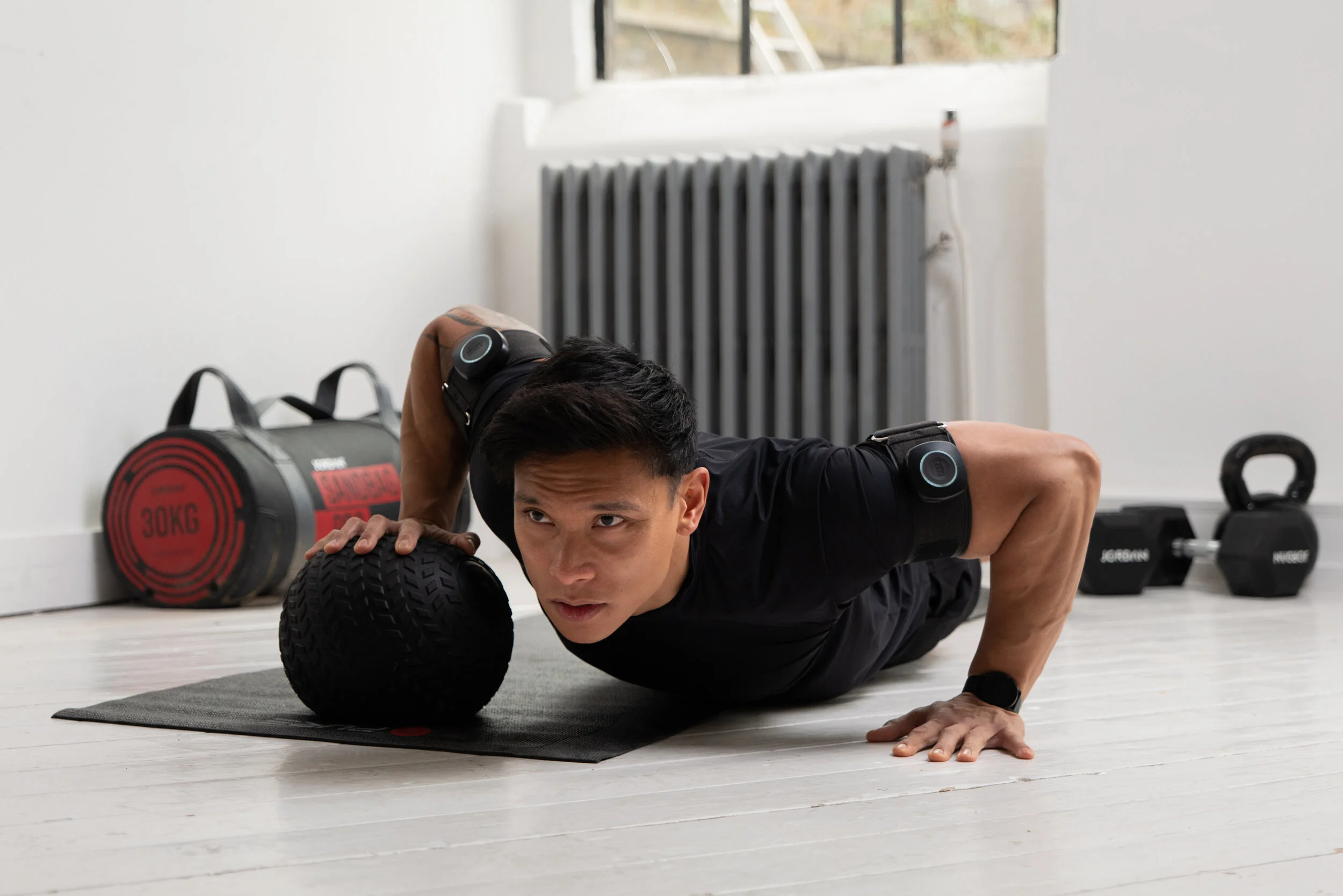 SAGA Fitness BFR training cuffs lifestyle photography